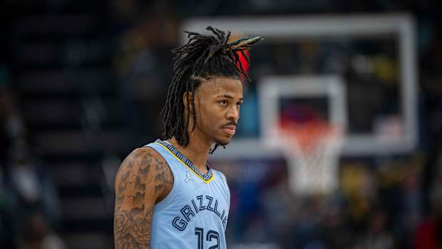 Ja Morant looks on during a game.